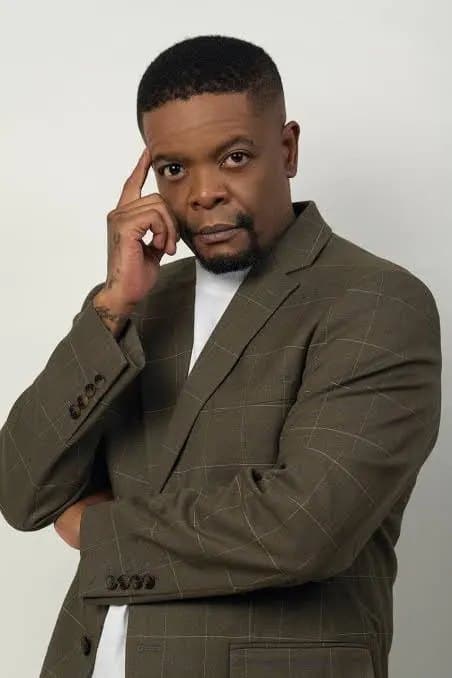 TREVOR GUMBI